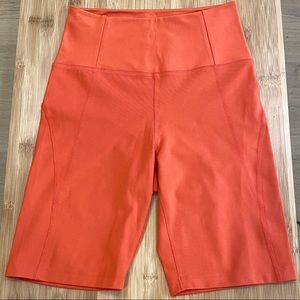Girlfriend Collective High-Rise Bike Short in Tart